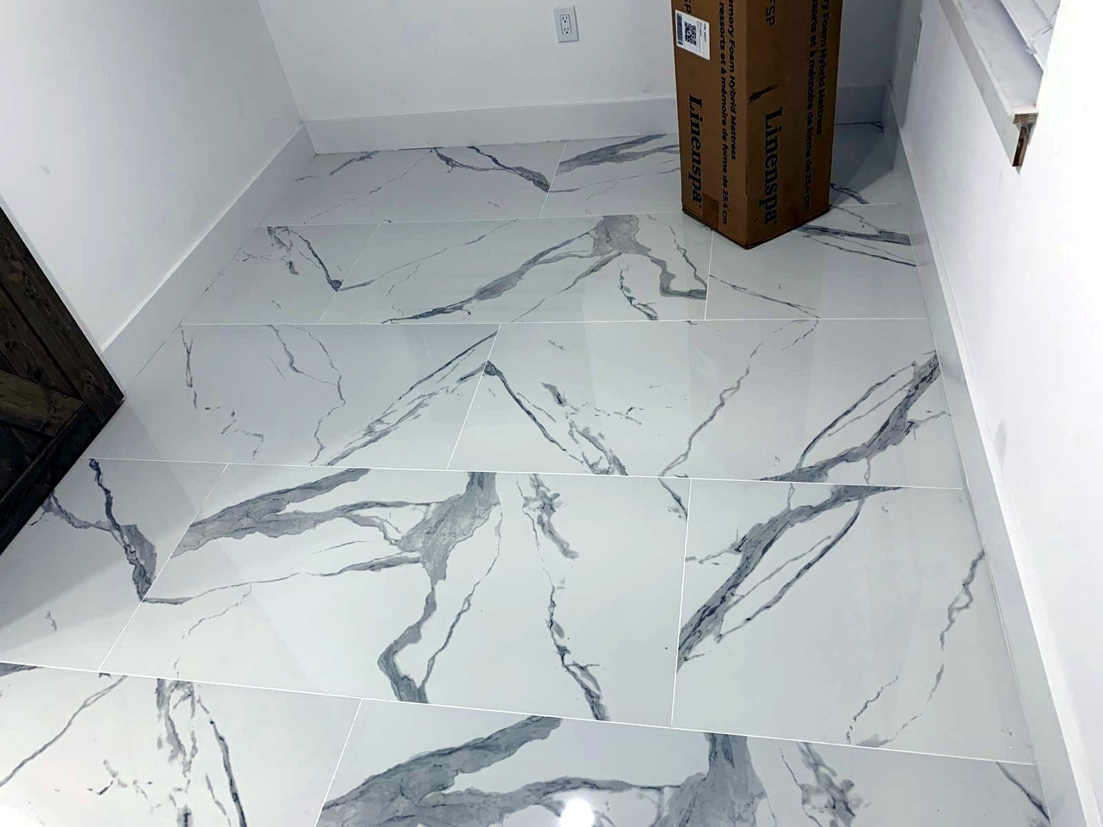 Tile and marble floor installed by our team