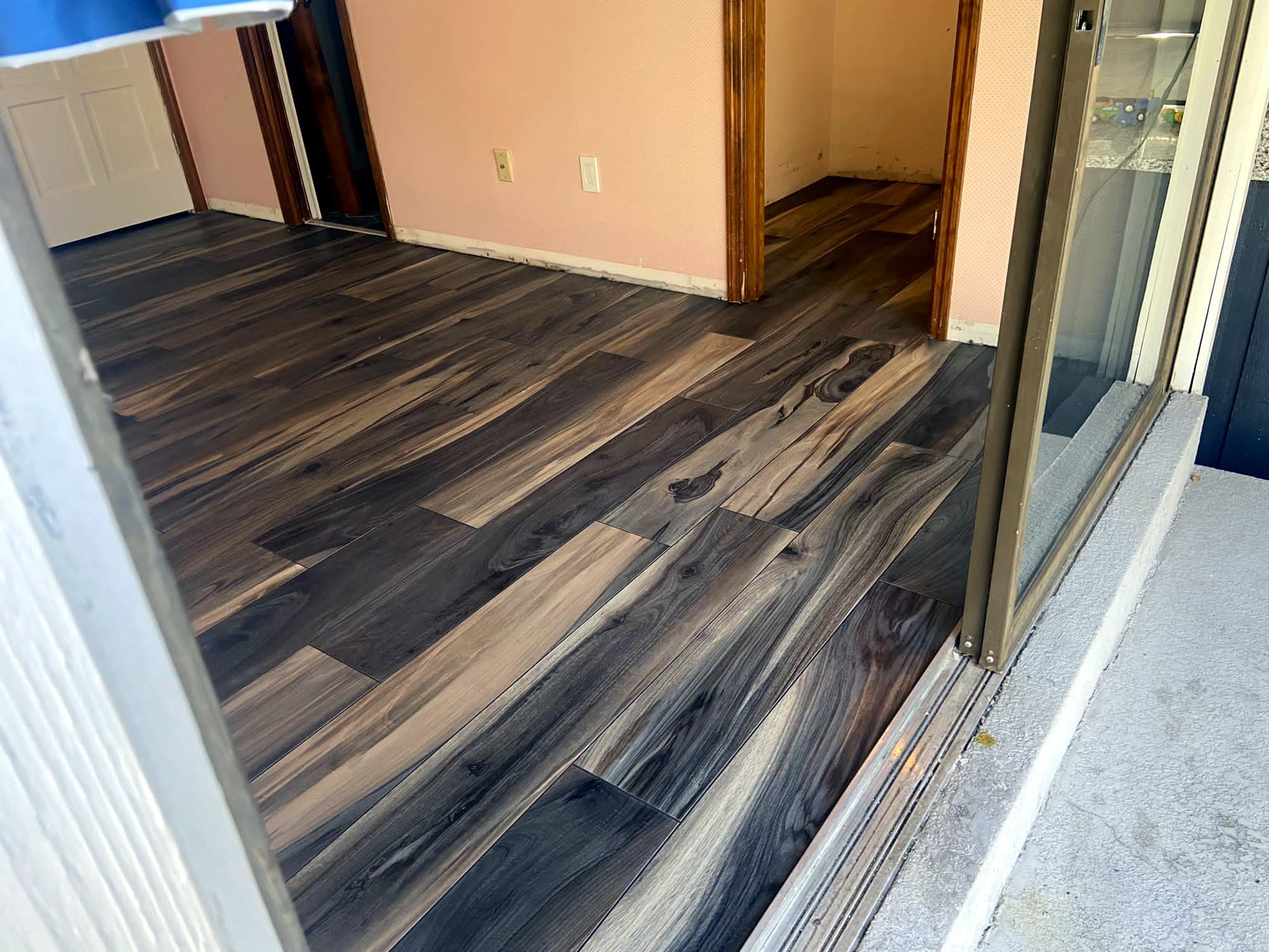 Dark wood-look room: Dark wood-look porcelain tile, photo 1