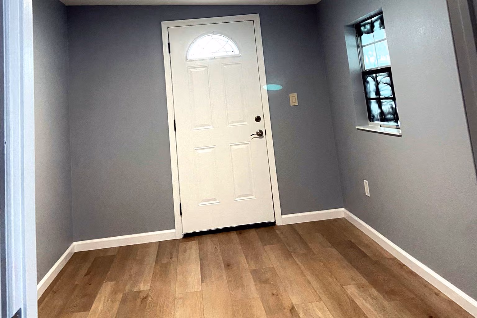 Entry and front rooms, after