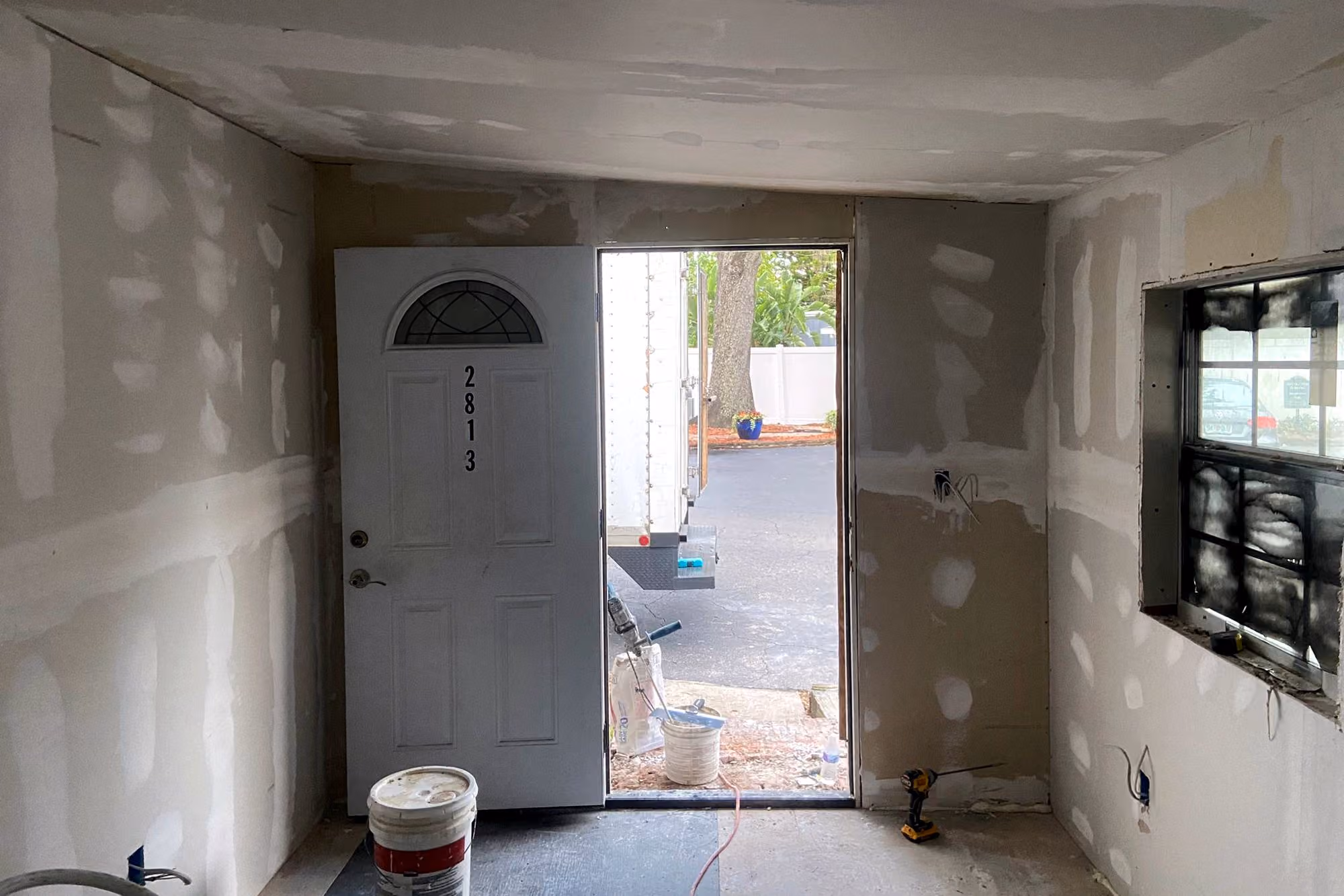 Entry and front rooms, before