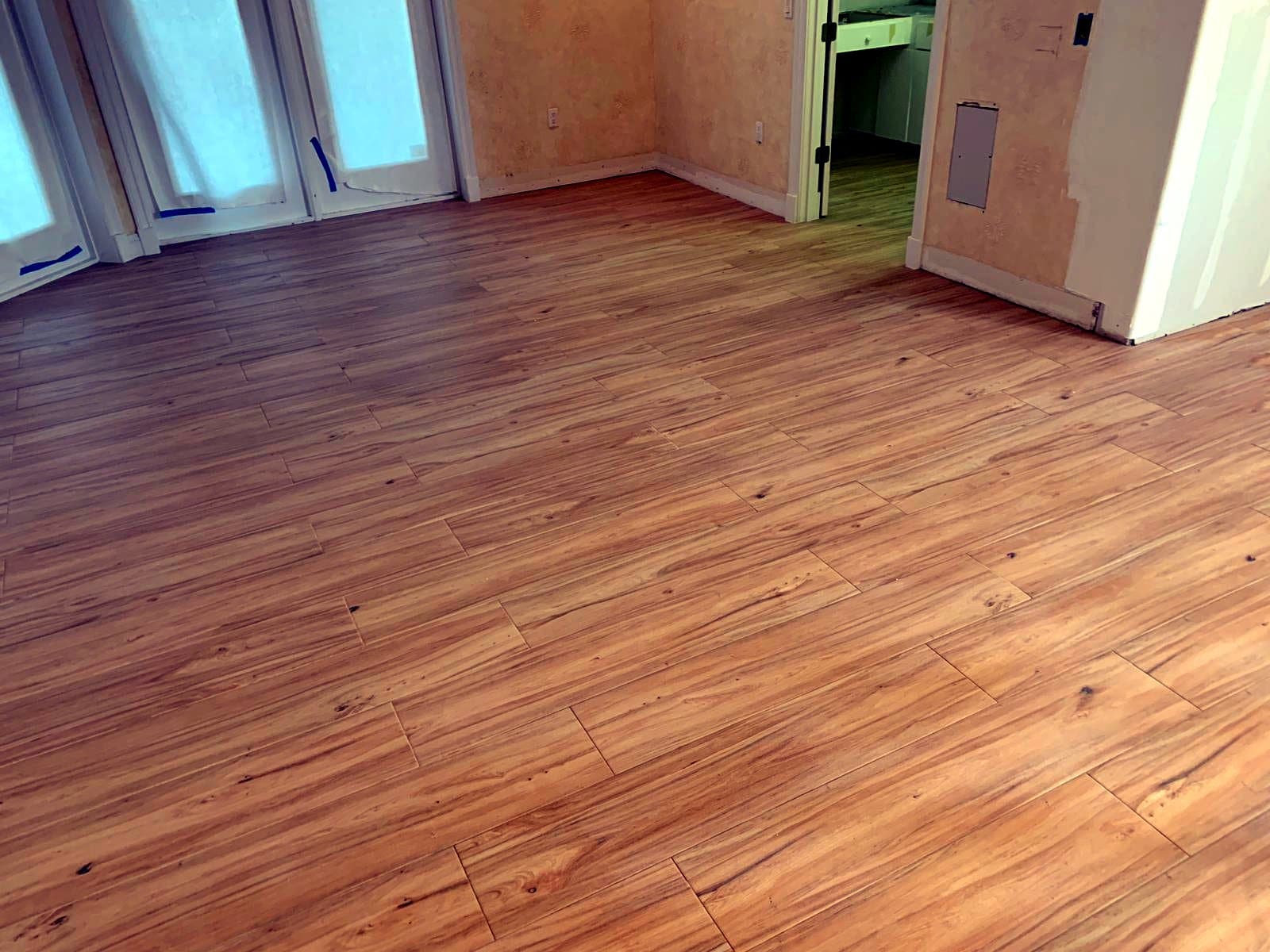 Room with French doors: Wood-look porcelain tile, photo 2