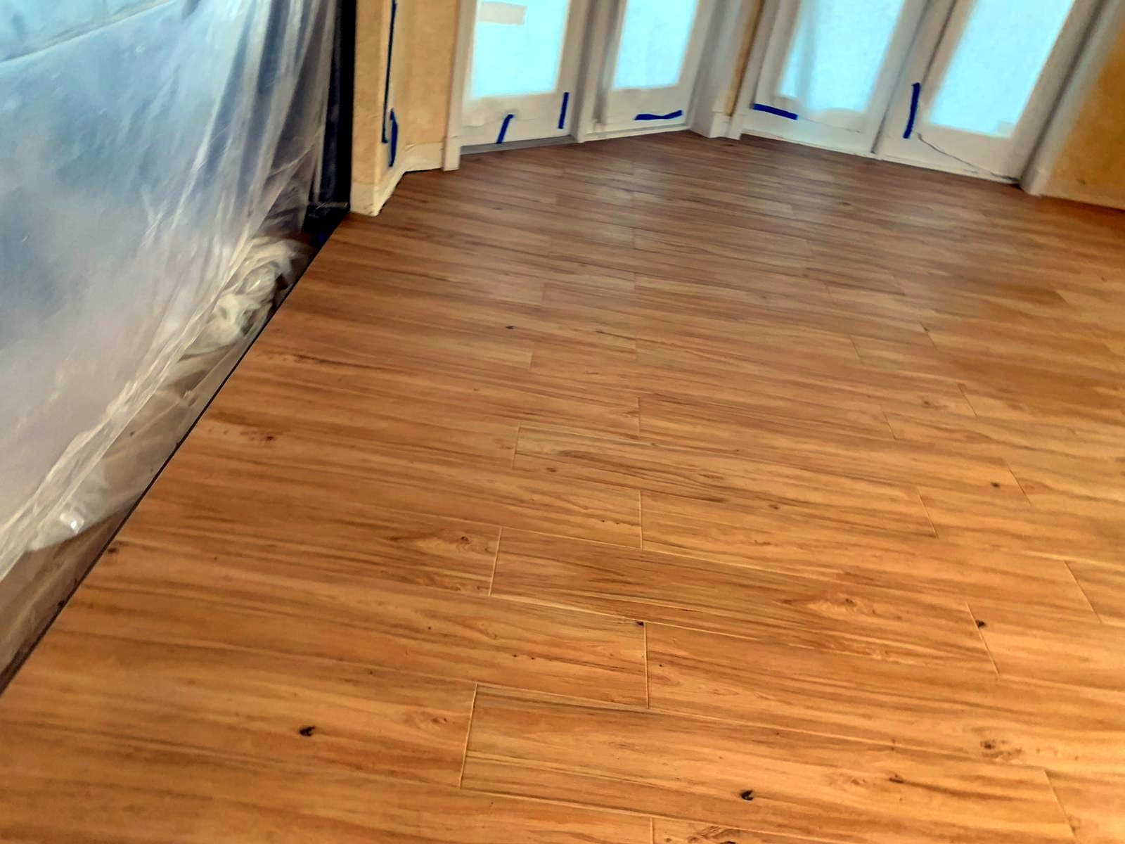 Room with French doors: Wood-look porcelain tile, photo 3