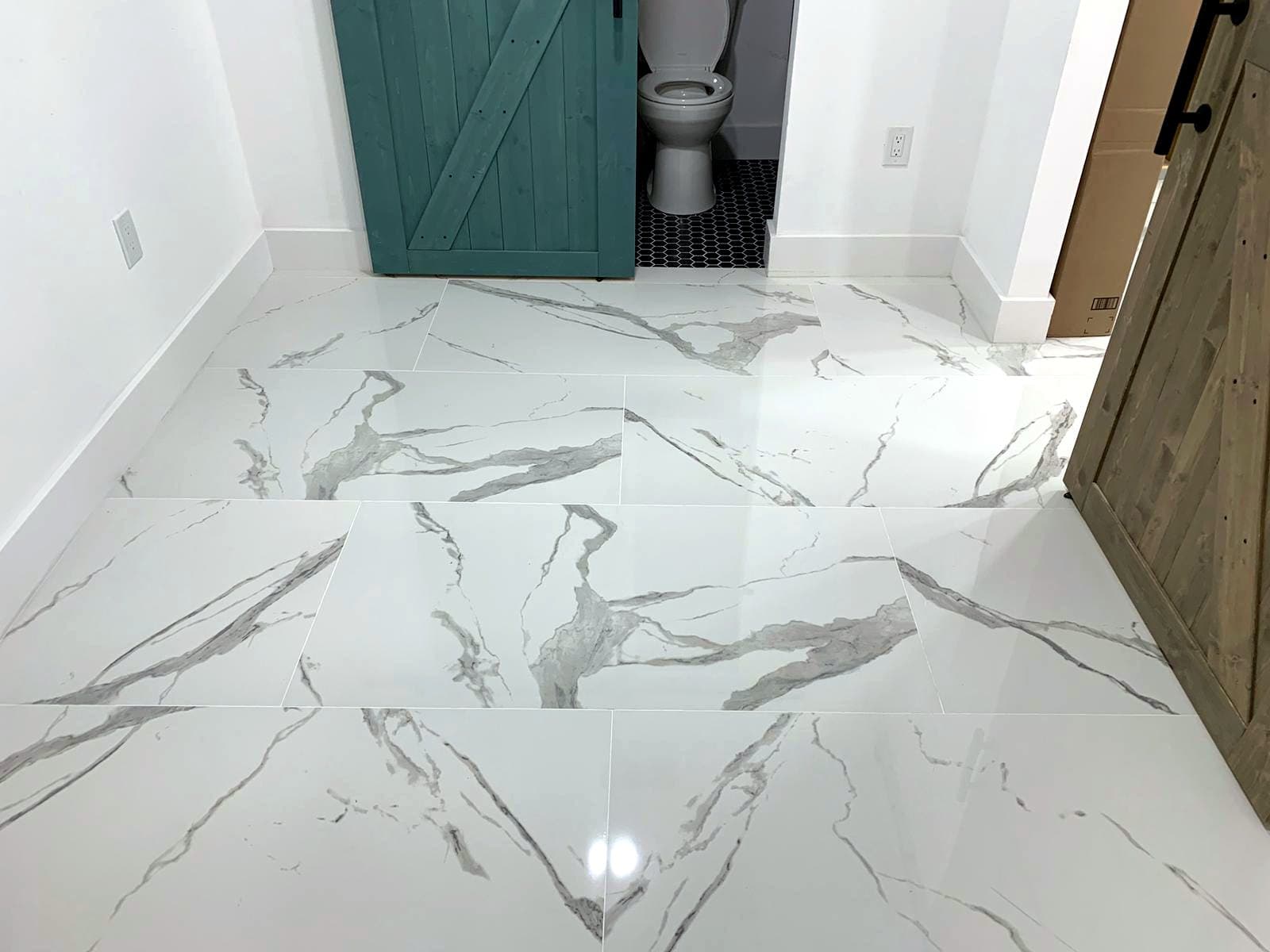 White marble-look bathroom and entry: Marble-look porcelain tile, photo 4